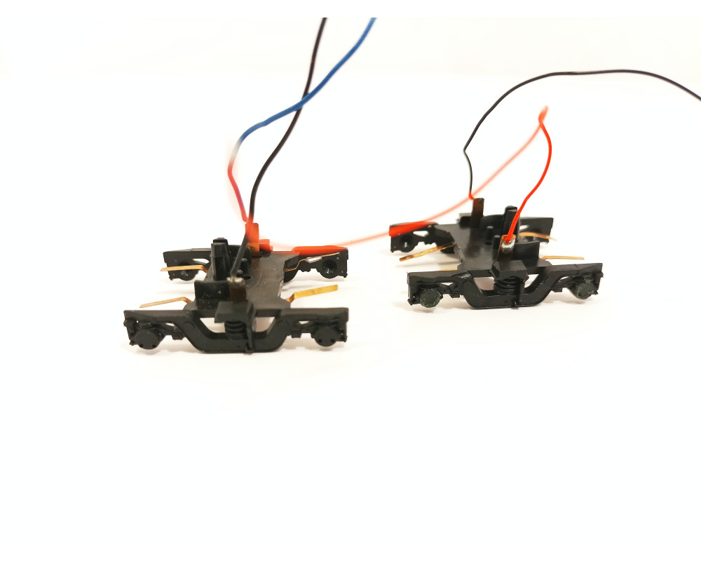 Pair of carriage bogies for MDVE carriage